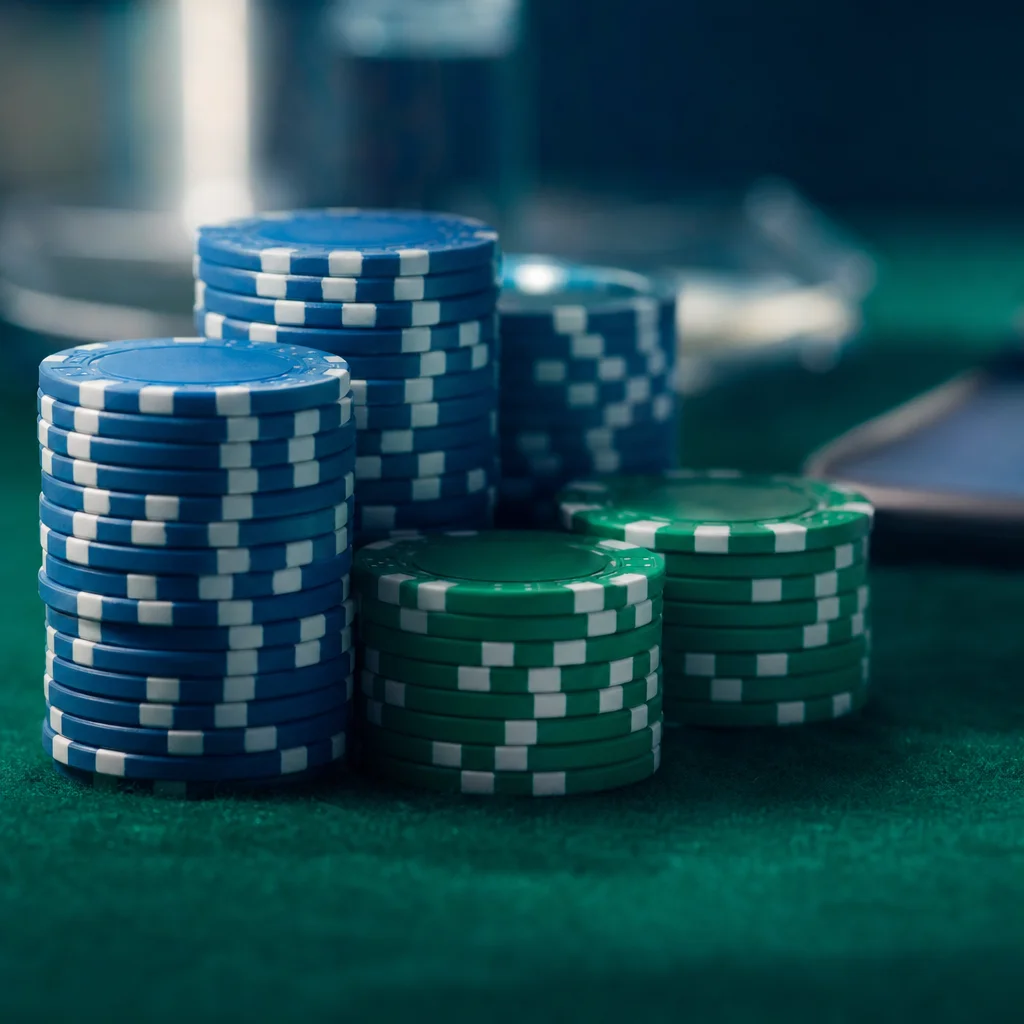 Chip stacks arranged in fixed betting increments on a stud poker table